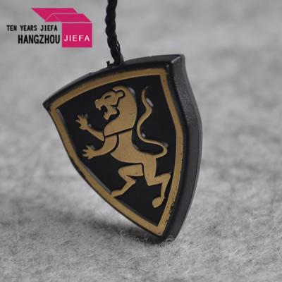 China Hot Stamping China Shape Sustainable Gold Triangle Plastic Tag Eyes Luxury Tag for sale