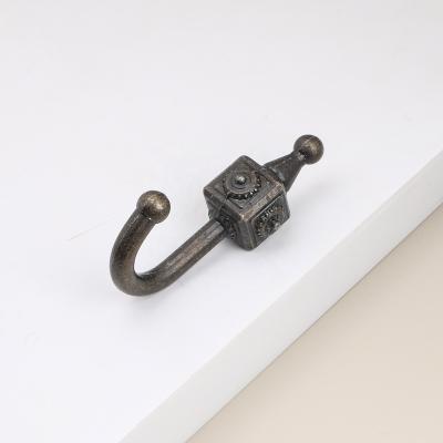 China Industrial Antique Green Bronze Hooks in Industrial Style, Heavy Duty, Wall Mounted for Hallways, Warehouses, and More. for sale