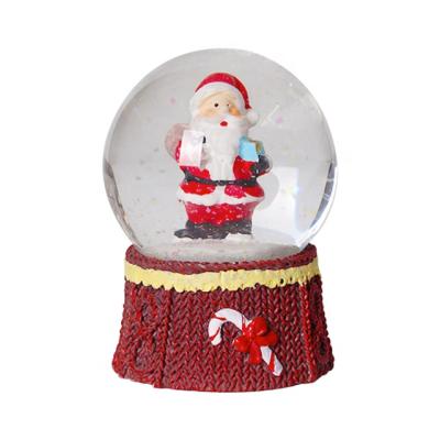 China Beautiful Hand Crank Operated Music Box Santa Claus Inside Crystal Ball Christmas Decoration Craft Gift For Christmas for sale