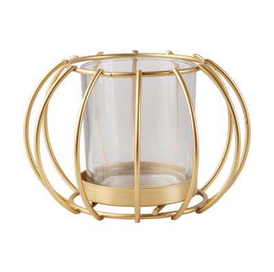 China Creative Hot Selling Light Luxury Creative Hollow Cup Gold Amazon Candle Decoration Pumpkin Lamp Iron Candle Holder Home Decoration for sale