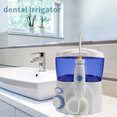 China Hotel Portable Dental Water Flosser 9 Nozzles 600ml Teeth Cleaning Oral Irrigator Dental Implants Family Use for sale