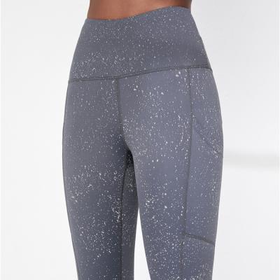 China New Wholesale Stock Quality Women Breathable Mottled Print Yoga Pants Fitness Gaiters With Side Pockets for sale