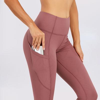 China New hot color woman high waist butt breathable embossing yoga wear embossing lifting gaiters for sale