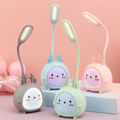 China Contemporary Bedroom Night Light USB Rechargeable Rechargeable Three-speed Dimming Cute Dorm Learning Reading Eye Protection LED Table Lamps for sale