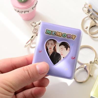 China Waterproof collect kpop mini scrapbook photo album for 1 inch photo 16 pockets heart hollow photo album for sale