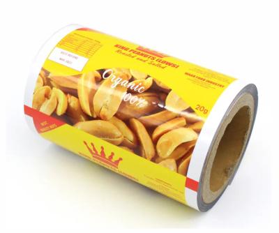 China Fabrica de rollo de película de impresión de plástico utilizado para bocadillos/chips de patata/envases de nueces, rollo de película de embalaje de bolsas pequeñas laminadas para bocadillos en venta