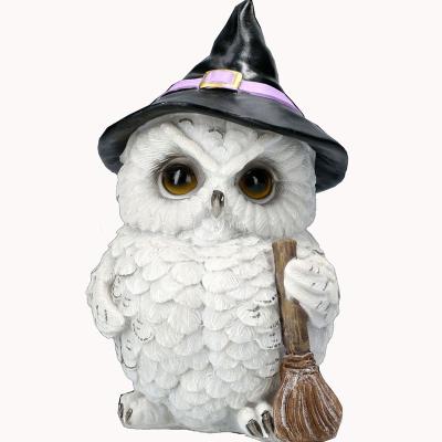 China Hot Sale Resin Owl Figurine From China Amazon With Witches Hat And Sweep Home Decoration Animal Figurine for sale