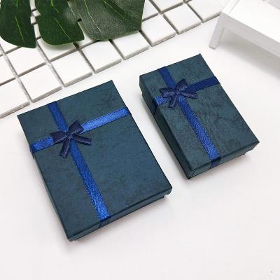 China Wholesale Custom Handcrafted Logo Wristband Printed Paper Box With Bow Handmade Colorful Cardboard Wristband Gift Box With Foam Inserts for sale