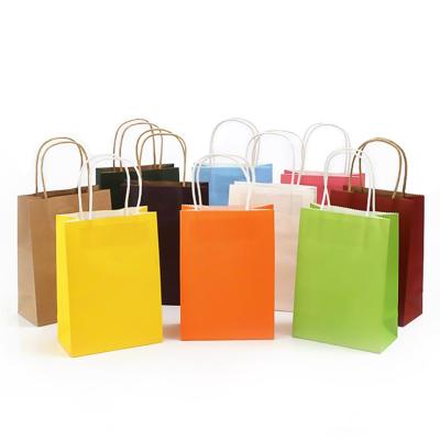 China Factory Direct Moisture Proof Customize Logo Various Color Kraft Paper Shopping Bags With Handles for sale