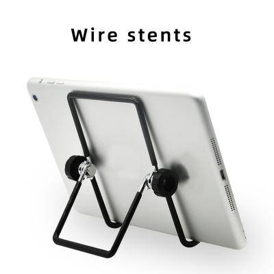 China Creative Triangle Mobile Phone Metal Tablet Teaching Machine Wire Stand Metal Lazy Folding Stand for sale