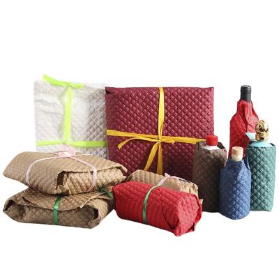 China Thickened Bubble Pad Kraft Paper Express Logistics Paper Biodegradable Packaging Cushioning Wrapping Roll for sale