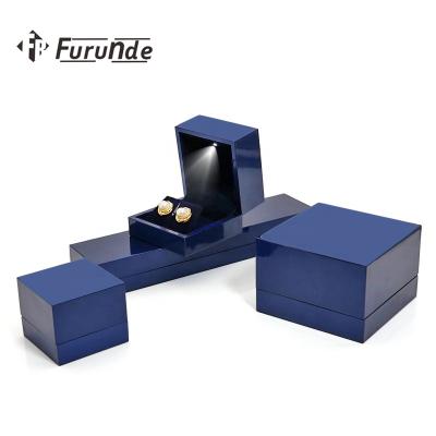 China 2021 Hot-selling black painting wholesales handmade ring box LED ring box jewelry storage box manufacturing for sale