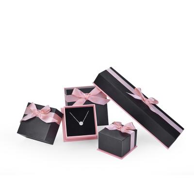 China Pink Paper Box Ring Earring Bracelet Necklace Packaging Handmade Custom Jewelry Logo Top And Bottom Bow for sale