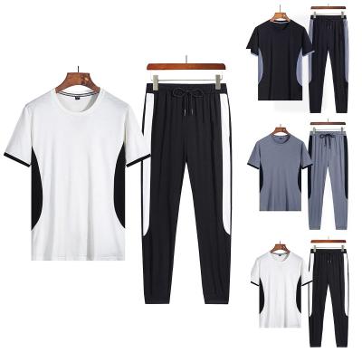 China 2022 QUICK DRY Summer Clothing Gym Fitness Sets Casual Short Sleeve O Neck Patchwork Custom Quick Dry Shorts Set Men for sale