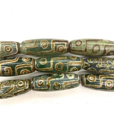 China Fashionable Wholesale Natural Green Gems Dzi Agate Nine Eyed Stone From Tibet Bead For Jewelry Making for sale