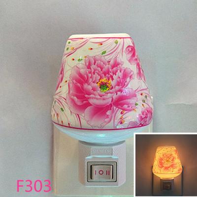 China Bedroom Living Room Fragrance Lamp and Aroma Lamp Ceramic Essential Oil Burner for sale