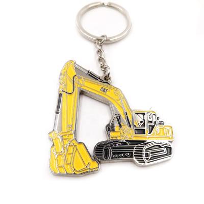 China Souvenir Gifts Promotion Fashion Metal Engraved Enamel Machinery Key Chain Excavator In Stock For Men Kids for sale