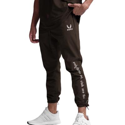 China 2022 New Fashion Casual Sports Men's Anti-Static Joggers Plus Size Solid Color Slim Fit Tapered Men's Jogger Quick Dry Men's Lounge Test for sale