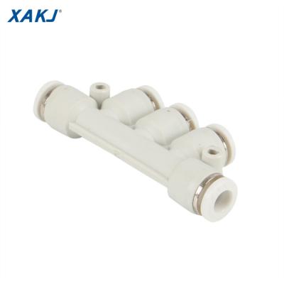 China Building Material Shops XAKJ PK Series 5 Equal White Triple Union Plastic Pneumatic Tires Push-to-Connect Tube Fitting for sale