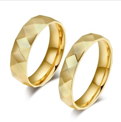 China Latest Stainless Steel New Arrival 22K Gold Ring Couple Stainless Steel Nutter Ring for sale