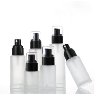 China Luxury Cosmetic Foundation Bottle 30ml Glass Lotion Spray Pump Liquid Cosmetic Bottle for sale