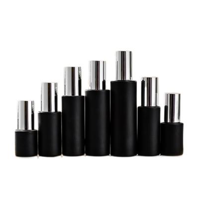 China Cosmetic Luxury Cosmetic Containers And Packaging Black Spray Pump Bottle Matte Glass Bottles For Cosmetics for sale