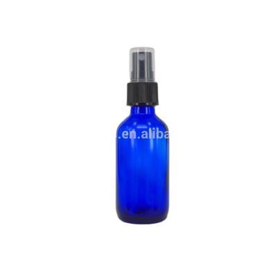 China Wholesale 2 oz Cobalt Blue Personal Care Lotion Boston Spray 60ml Glass Bottle Round Bottle for sale