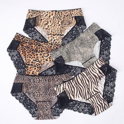 China Antibacterial Transparent Breathable Silk Mid Underwear Comfortable Belly Waist Ice Ladies Lace Up Lady Briefs Leopard Print Panties for sale