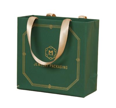 China Recyclable Luxury Custom Printed Paper Bag Logo Clothes Shoes Packaging Shopping Paper Bag for sale