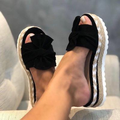 China Hot Sale Fashion Trend Wedges Sandals Trend Thick Non-Slip Thick Bottom Slope With Hemp Rope Bow Slippers Women's Slippers for sale