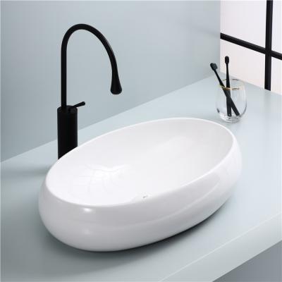 China Durable Wholesale Modern Ceramic Bathroom Vanity Fashion Oval Over Counter Basin for sale