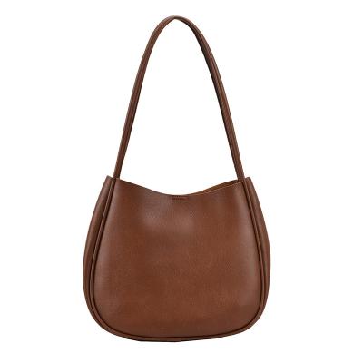 China 2022 New Crescent Bag Handheld Bag Korean Texture Minority Fashion Women's Single Shoulder Armpit Saddle Bag for sale