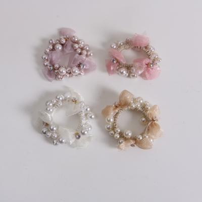 China Korean Fresh Main Hair Beaded Hair Rope Female Pearl Head Tie Hair Rope Hair Ring Pearl Rope Flower Bow Dish Ball Ponytail Head Rope for sale