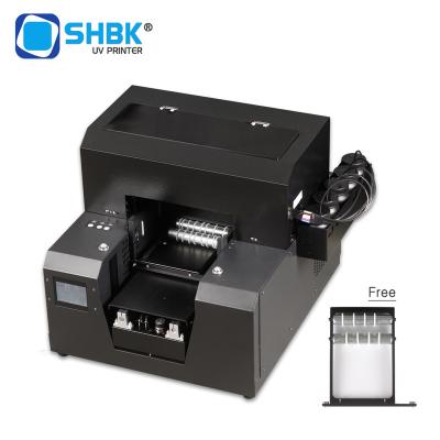 China Hotels SHBK Full Automatic 2-in-1 For Bottle, Phone Case PVC Metal Time Printing White And Color A4 Wood UV Cylindrical Printer One for sale