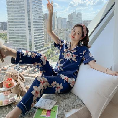 China QUICK DRY oversized cardigan pajamas ladies lapels lightly flowers short sleeve pants silk pajamas for sale