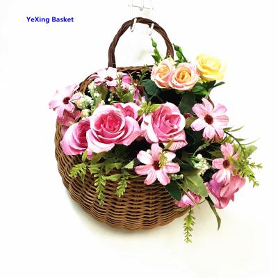 China China Sustainable Handmade Eco-friendly Rattan Wholesale Plant Hanging Basket Flower Basket for sale