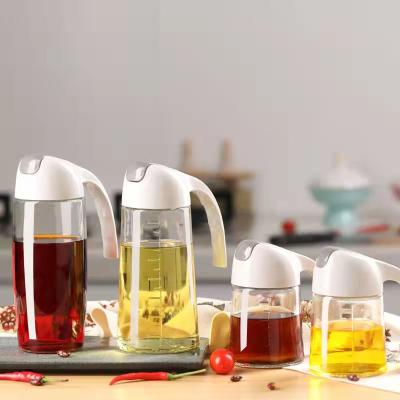 China Daily Life Kitchenware Glass Oil Can Automatically Opening Seasoning Bottle for sale