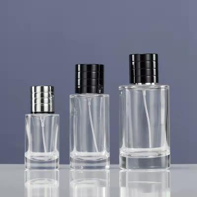 China Cosmetic Cylindrical Empty Perfume Bottles 30ml 50ml 100ml Custom Perfume Bottles for sale