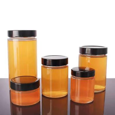 China Food 106ml 212ml 314ml Honey Jar Glass Jam Jar With Deep Twist Off Lids for sale