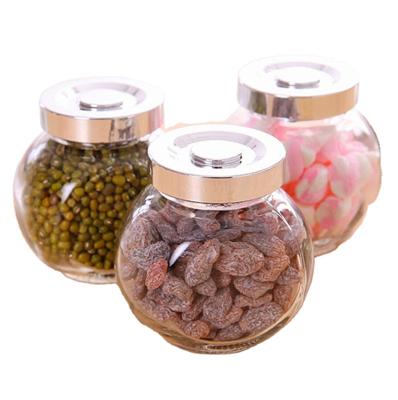 China Freshness Preservation Creative Transparent Household Drum Bottle Seasoning Storage Glass Flat Jar for sale