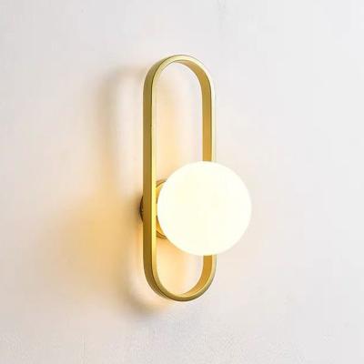 China Gold Modern Decorative Indoor Metal Hotel Wall Metal Glass Wall Lamp Led Modern Lighting for sale