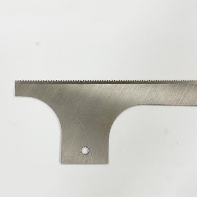 China Building Material Stores Serrated Packing Machine Blade Serrated White Cutting Knives for sale