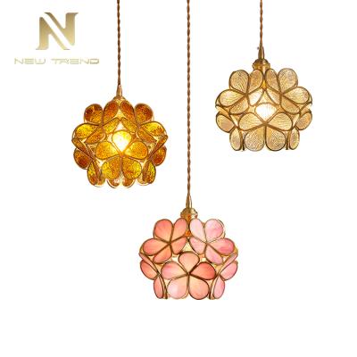 China Beautiful modern flower shape lighting for bedroom living room glass copper clear led wall lamp for sale