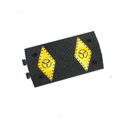 China Anti-Pressure 500(L)*300(W)*50(H)mm Aisle Anti-Pressure One Way Reflective Recycled Rubber Speed ​​Bump For Sale for sale