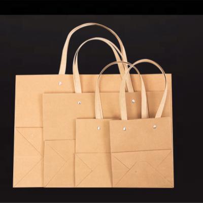 China Recycled Materials Custom Paper Bags With Your Own Logo Cheap Wholesale Luxury Recycled Printed Kraft Paper Bag711463 for sale