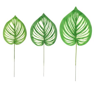 China Modern monstera leaf wedding decoration office simple palm leaf artificial green leaf dill for sale