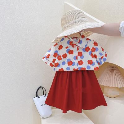 China Sweet Hot Sale Girls Clothing Set Summer 2pcs Shorts Sleeve Flowers Printing Shirt And Skirt Set Kids Clothes Set for sale