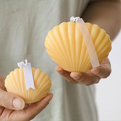 China UO Logo Creative Diy Shell Candles Small Scallops Home Decor Handmade Home Decor Wedding Decoration Shape Scented Candles for sale