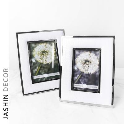 China Beautiful luxury 5*7/modern decorative high quality metallic silver white frames for pictures for sale