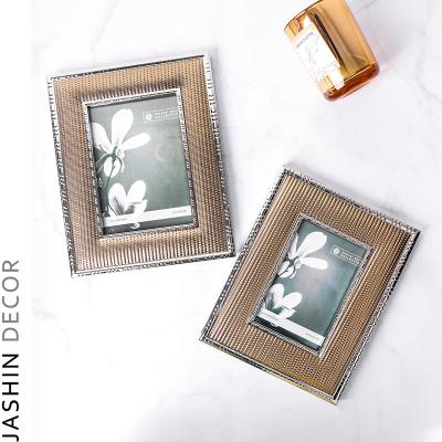 China Modern Leather Metal Girl Stand Light Wedding Photo Frame Luxury/Modern Online Shopping for sale